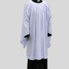 Old English style white surplice with gathered yoke on a mannequin over a black cassock
