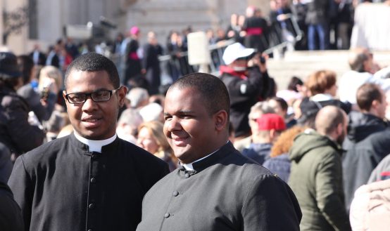 What clothes do priests wear